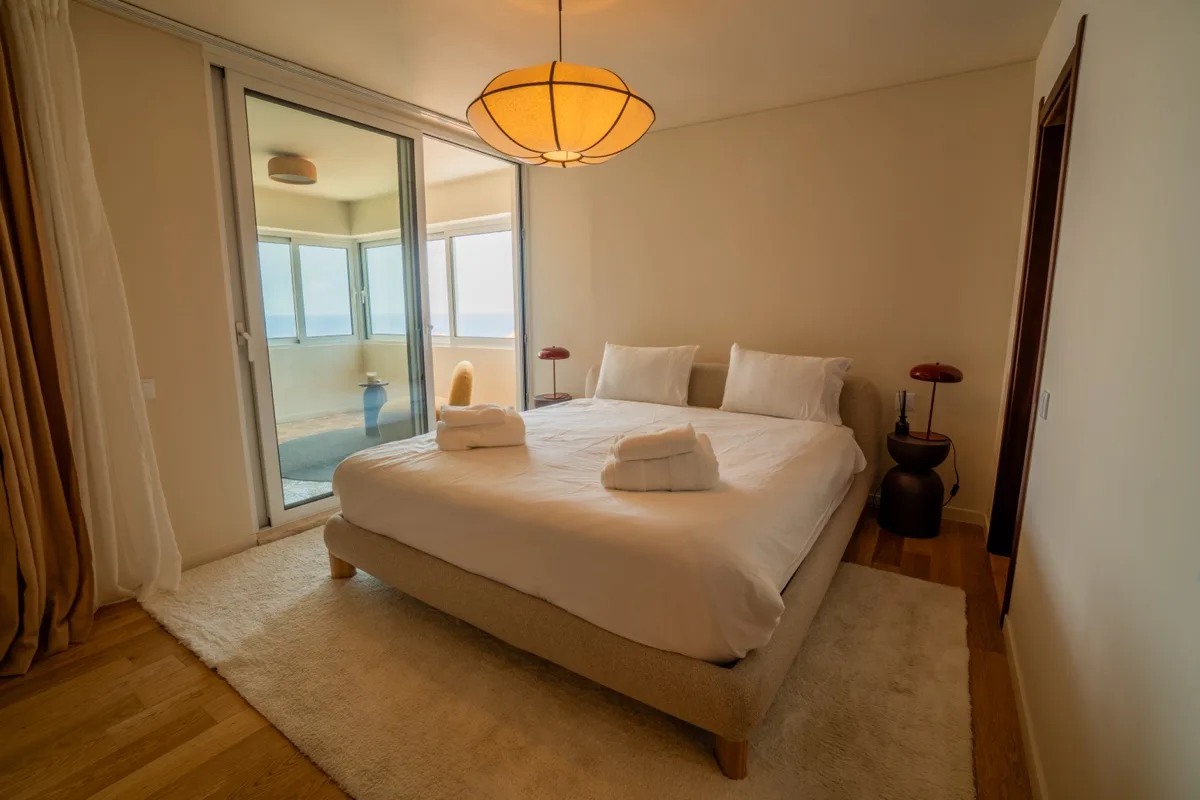 Bedroom one opening to the ocean balcony