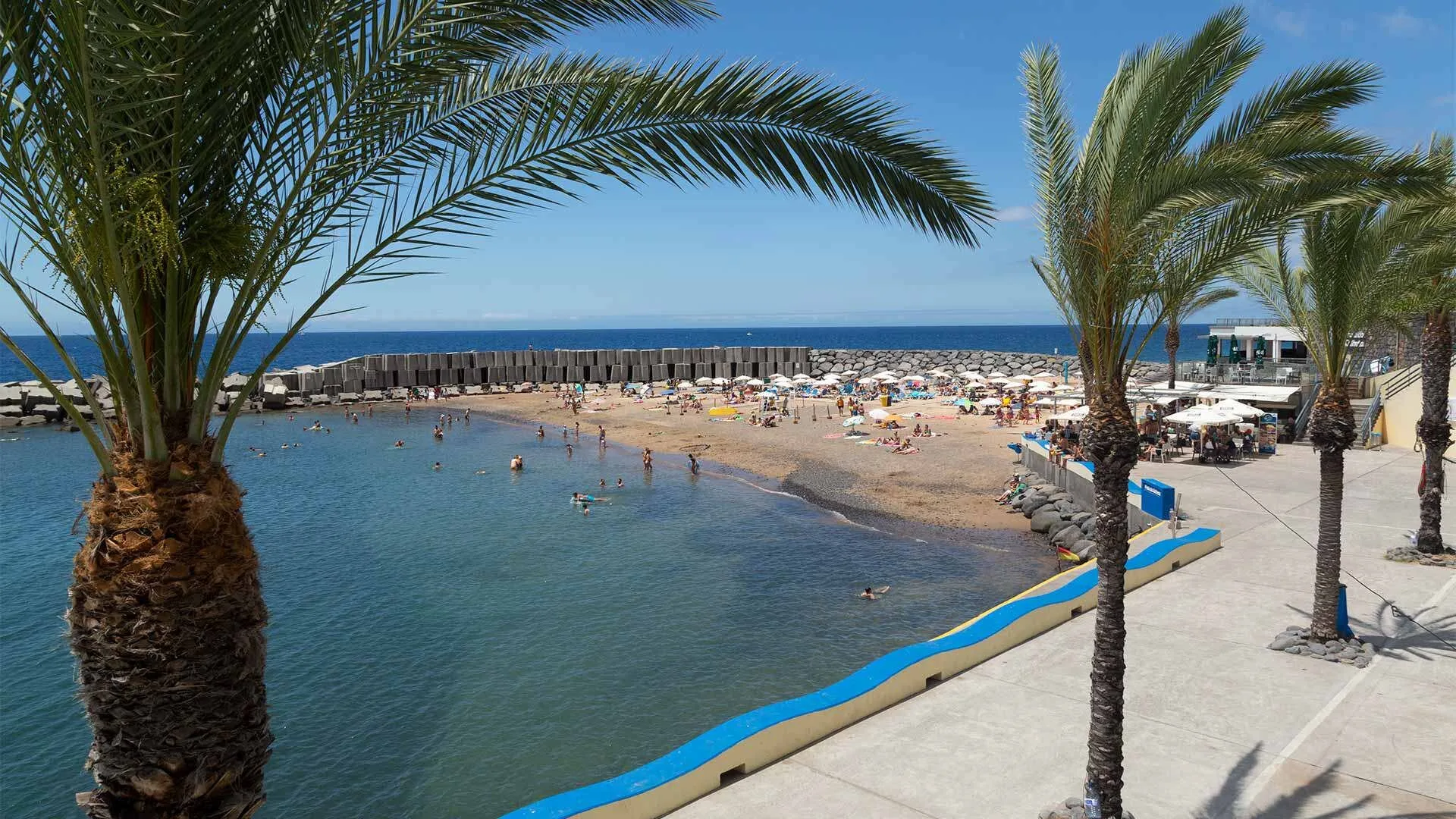 Praia da Calheta — one of Madeira's rare sandy beaches, minutes from the villa